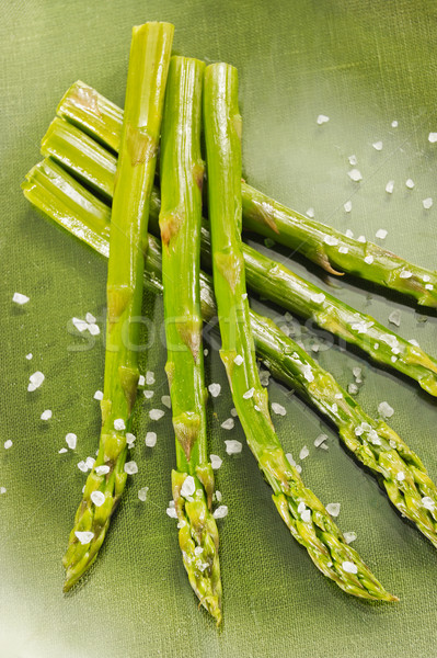 Asparagus with salt on a glass Stock photo © bogumil