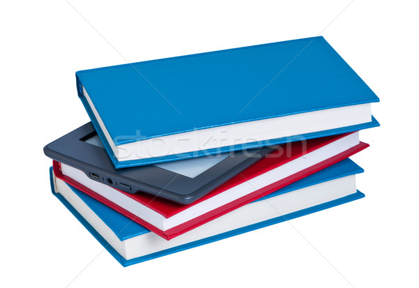 E-reader in a stack of books. Stock photo © borysshevchuk