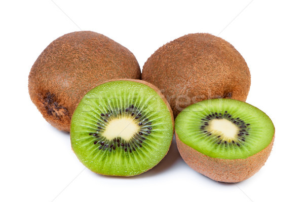 Sliced ​​kiwi fruit core is seen on a white background. Stock photo © borysshevchuk