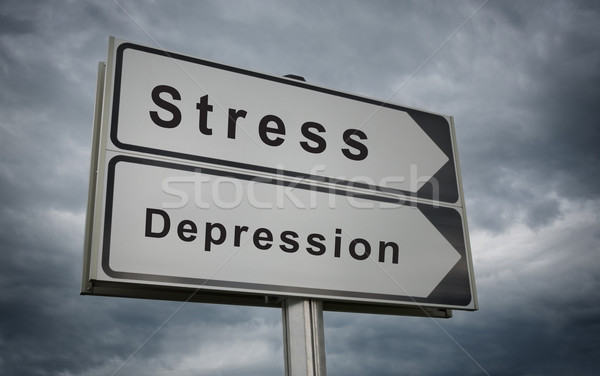 Stress Depression road sign on background of dark clouds. Stock photo © borysshevchuk
