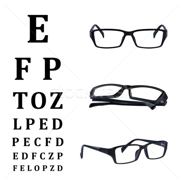 Eye glasses isolated with eye chart. Stock photo © borysshevchuk