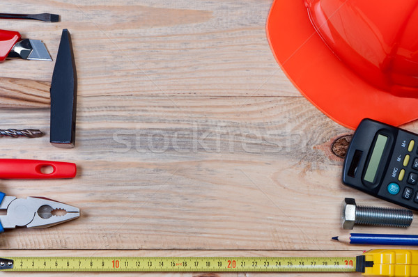 Set of construction tools on wooden board. Stock photo © borysshevchuk