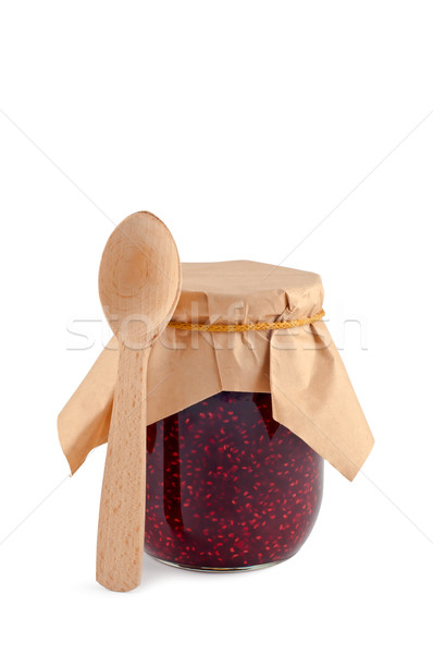 Jam in jar, wooden spoon, isolated on white, shade below. Stock photo © borysshevchuk