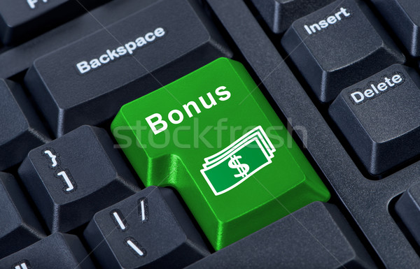 Button keypad bonus with money symbol. Stock photo © borysshevchuk