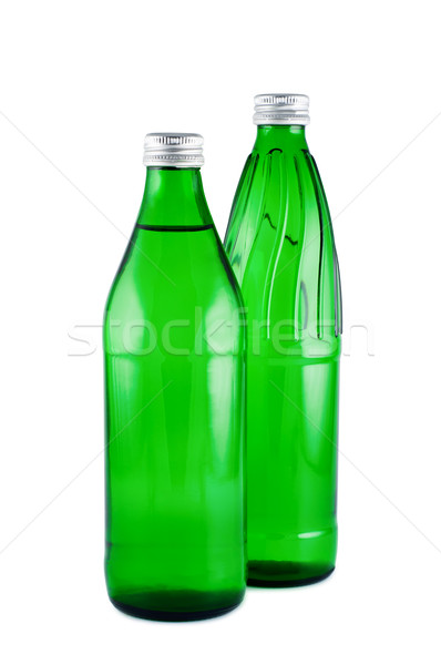 Twee flessen water geïsoleerd witte Stockfoto © borysshevchuk