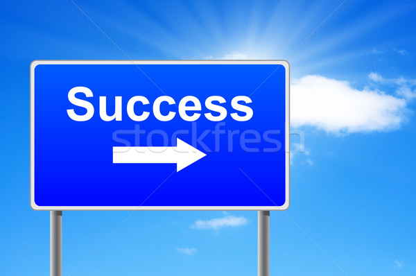 Success road sign with arrow on sky background. Stock photo © borysshevchuk