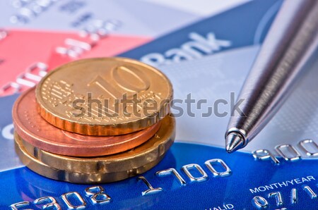 Kredi kartları iki madeni para euro sent iş Stok fotoğraf © borysshevchuk