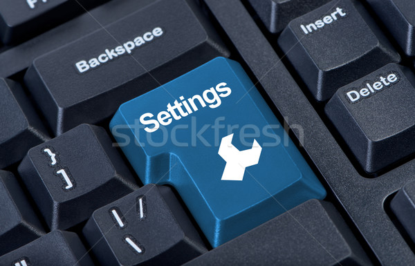 Button keypad settings with wrench icon. Stock photo © borysshevchuk