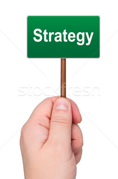 Sign with word strategy holds in hand isolated. Stock photo © borysshevchuk