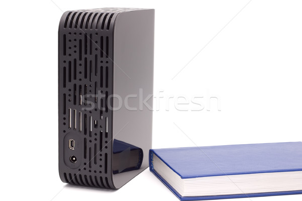 External hard disk and the book.  Stock photo © borysshevchuk