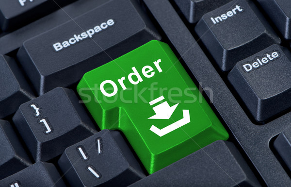 Stock photo: Order green button computer keyboard.