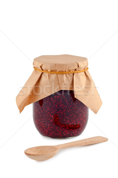 Jam in jar, wooden spoon, isolated on white background. Stock photo © borysshevchuk