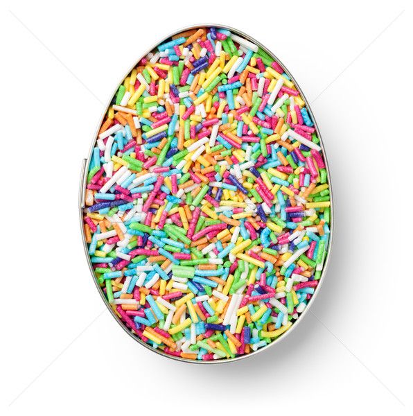 Colorful Candy Sprinkles in Cookie Cutter in Shape of Egg Stock photo © Bozena_Fulawka