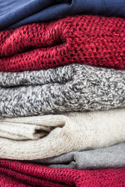 Stock photo: Stack of handmade wool sweaters