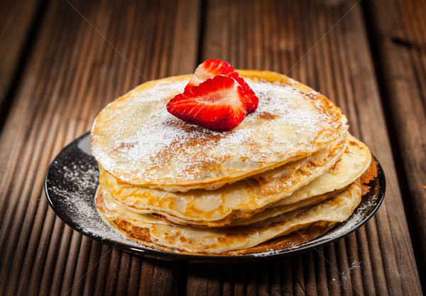 Crepes with fresh strawberries Stock photo © brebca