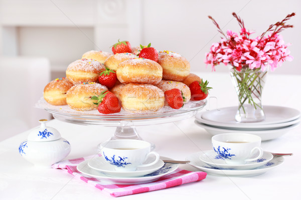 Berliner - doughnut filled with strawberry jam Stock photo © brebca