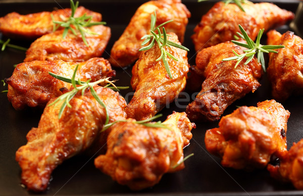 Sıcak tavuk kanatlar tepsi gıda Stok fotoğraf © brebca