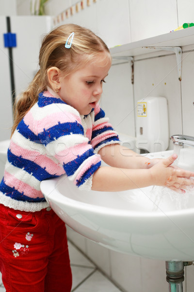 Kid washing hands Stock photo © brebca