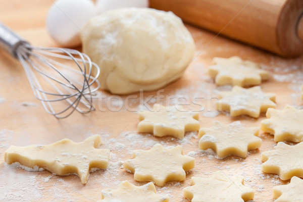 Kitchen utensil with raw Christmas cookies Stock photo © brebca