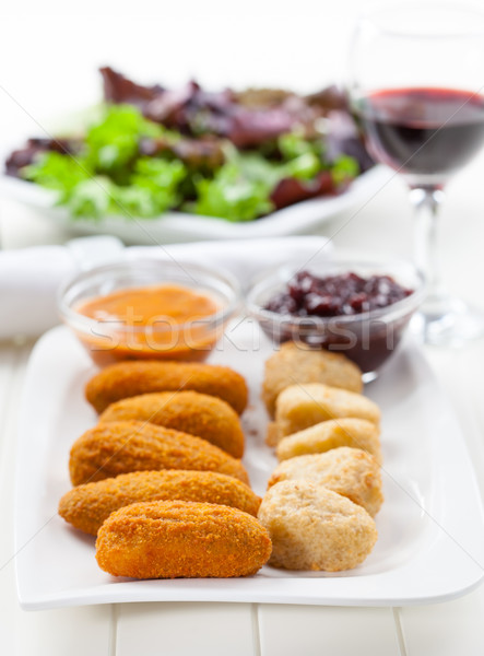 Delicious cheese sticks with chutney Stock photo © brebca
