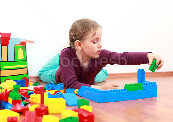 Adorable fille jouer blocs enfants construction [[stock_photo]] © brebca