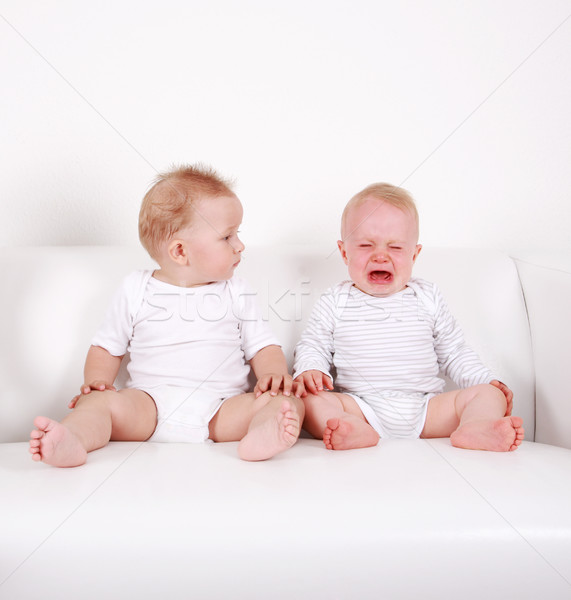 Iki tatlı bebekler bir bakıyor ağlayan Stok fotoğraf © brebca
