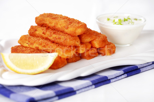 Fried fish sticks with remoulade Stock photo © brebca