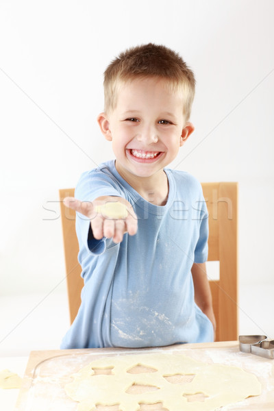 Boy baking cookies Stock photo © brebca