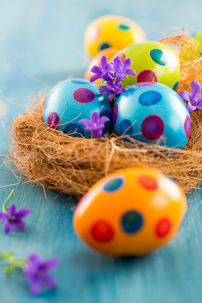 Colorful Easter eggs with spring flowers Stock photo © brebca