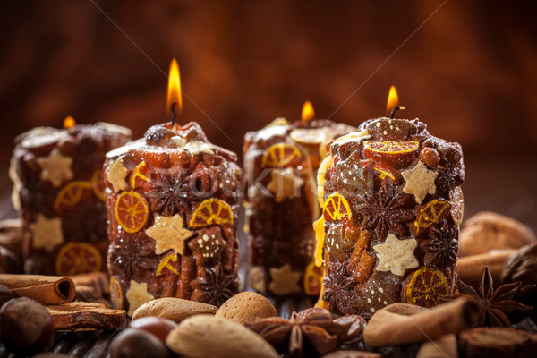 Stock photo: Rustic Christmas candles with spices and  nuts
