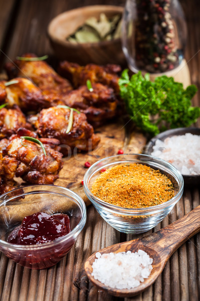 BBQ chicken wings with spices and dip Stock photo © brebca