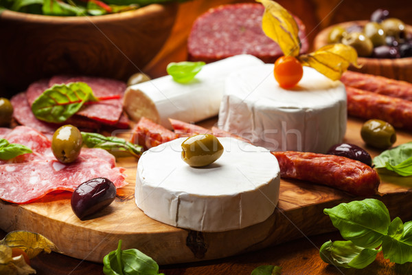 Antipasto catering platter with different meat and cheese products Stock photo © brebca