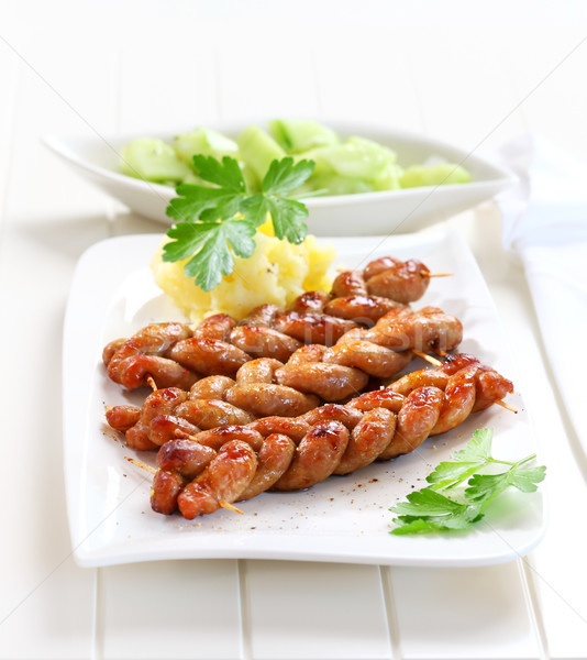 Cârnat castravete salată cină Imagine de stoc © brebca