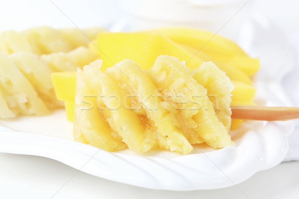 Pineapple on stick Stock photo © brebca