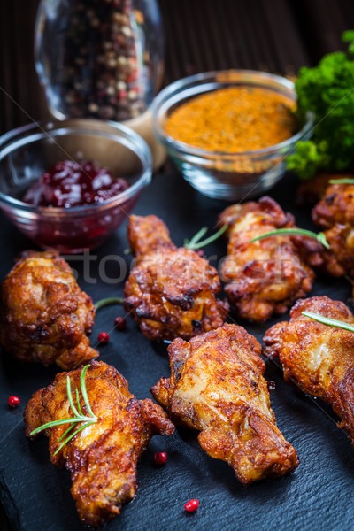 BBQ chicken wings with spices and dip Stock photo © brebca