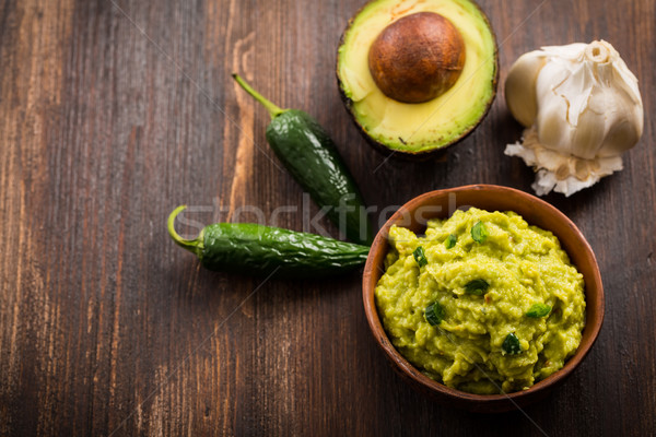 Guacamole with ingredients Stock photo © brebca