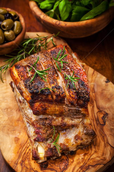 Roasted pork with herbs Stock photo © brebca