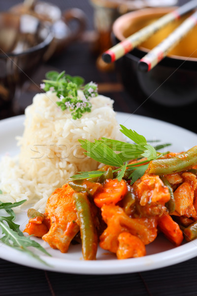 Red chicken curry stripes with rice Stock photo © brebca