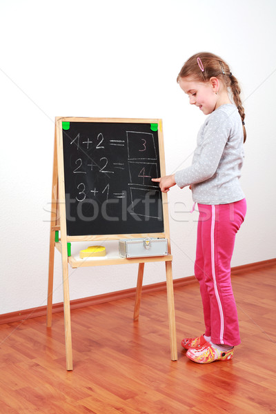 Cute girl doing math Stock photo © brebca