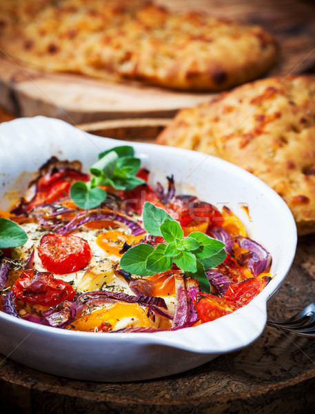 Baked feta cheese with vegetables Stock photo © brebca