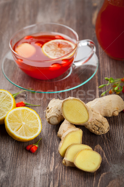 Tea with fresh goji berries and ginger Stock photo © brebca