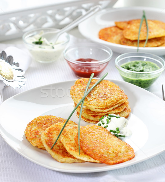 Potato pancakes with three dips Stock photo © brebca