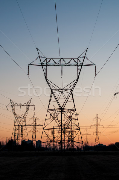 Elektrischen Türme Strom Sonnenuntergang lange line Stock foto © brianguest