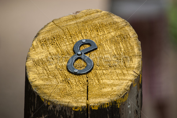 Number Eight on a Painted Wooden Post Stock photo © brianguest