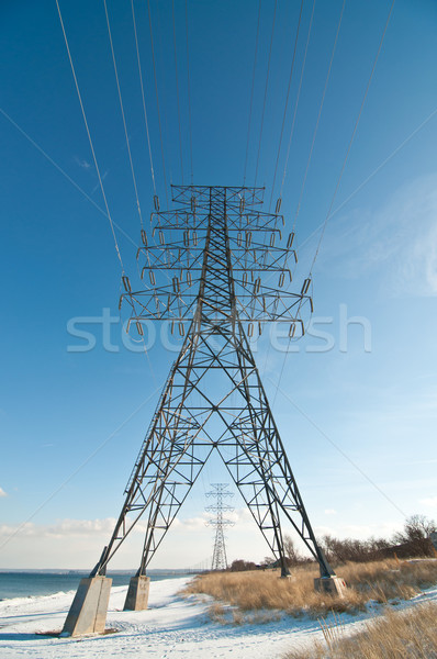 Elektomos torony elektromosság vmi mellett tó hordoz Stock fotó © brianguest