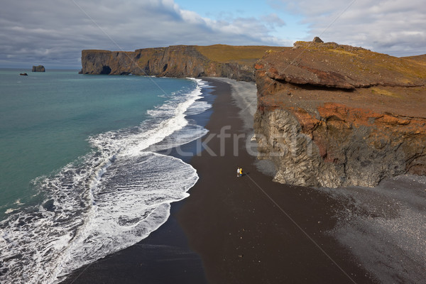 Black sand beach with Lundadrangur Rock Arch in Dyrholaey, South Stock photo © broker