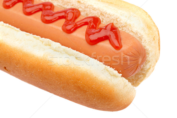 Hot dog ketchup geïsoleerd witte ondiep brood Stockfoto © broker