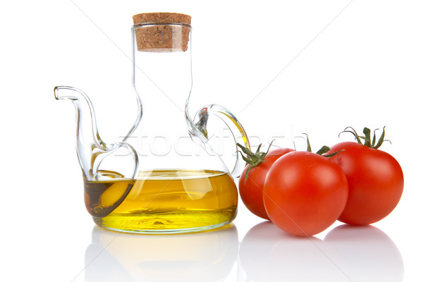 Tomatoes and oilcan Stock photo © broker
