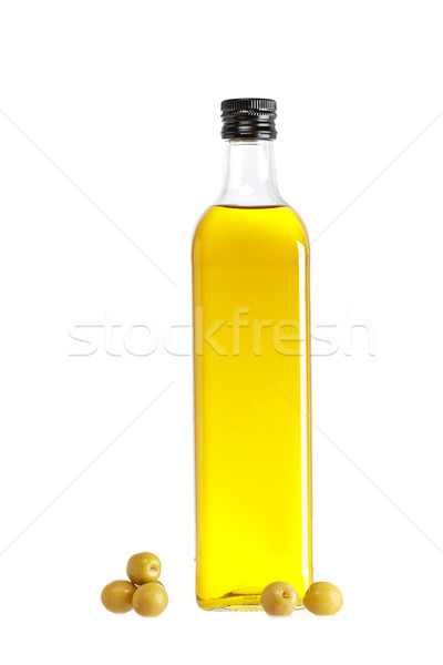 Olive oil bottle and some olives Stock photo © broker
