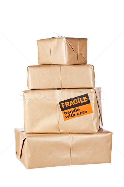 Barna csomagok boglya izolált fehér sekély Stock fotó © broker